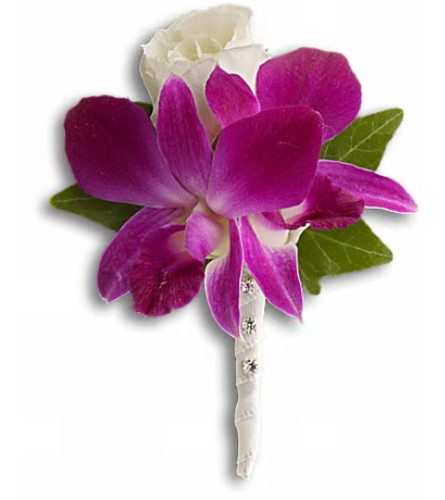 Fresh in Fuchsia Boutonniere. An arrangement by Ada's Flowers.