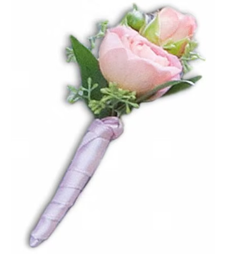 My First Boutonniere. An arrangement by Ada's Flowers.