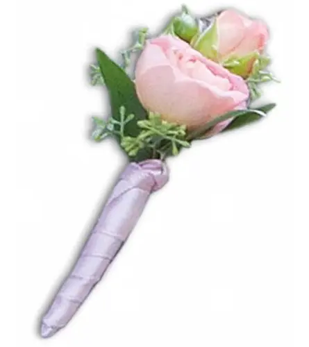 My First Boutonniere. An arrangement by Very's Flowers.