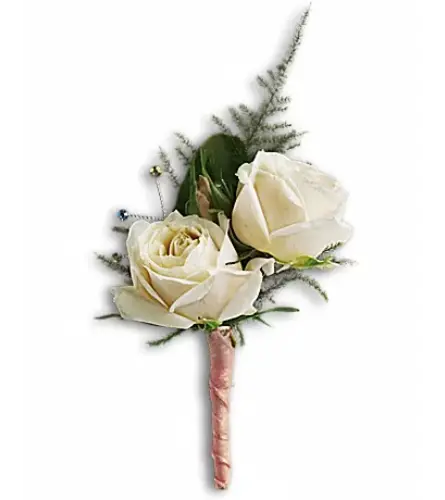 White Tie Boutonniere. An arrangement by Very's Flowers.