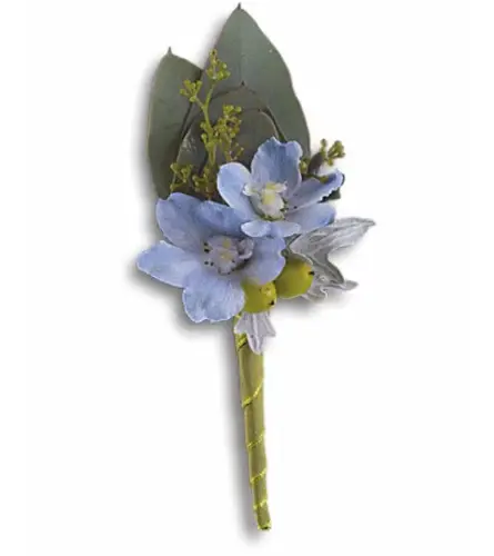 Hero's Blue Boutonniere. An arrangement by Fendley Florists.