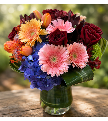 Radiant Blossom Harmony. An arrangement by Floral Lady Design Studio LLC.