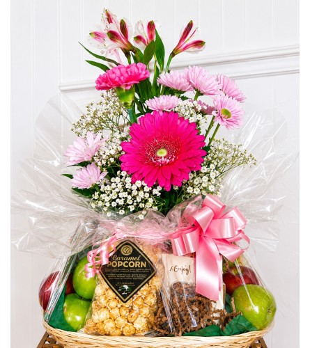 Gourmet Fruit and Flower Basket. An arrangement by Fink Flowers Gifts and Flower Delivery.