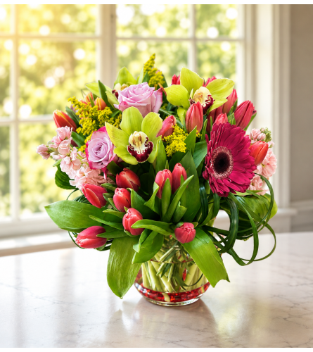 Tropical Garden Arrangement. An arrangement by Floral Lady Design Studio LLC.