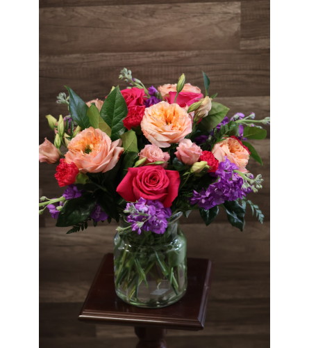 Peach Summer Garden - Deluxe. An arrangement by Sonia's Florist.