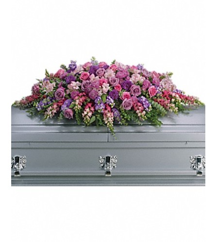 Lavender Tribute Casket Spray. An arrangement by Fendley Florists.