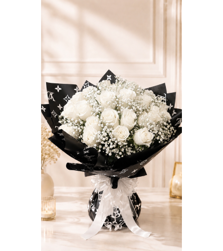 Whispering White Roses. An arrangement by Floral Lady Design Studio LLC.