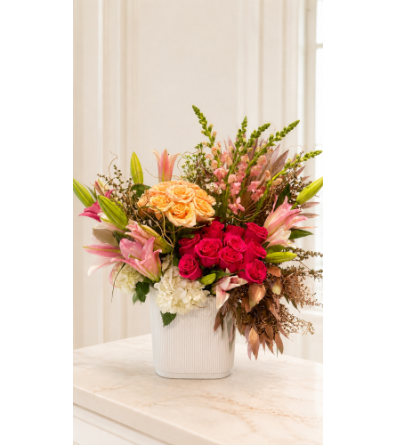 Peach and Passion Elegance. An arrangement by Floral Lady Design Studio LLC.