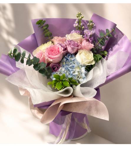 Pastel Dream Mixed Bouquet. An arrangement by Queens Flowers.