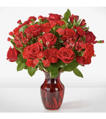 Valentine's Classic Red - Deluxe. An arrangement by Andreas Flowers Kissimmee.