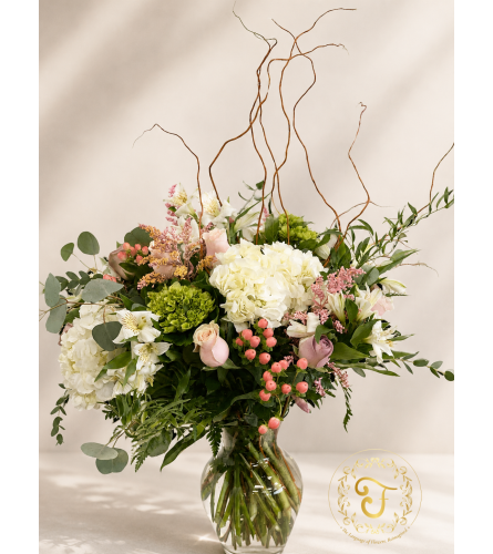 Garden Whimsy. An arrangement by Anderson Flowers.