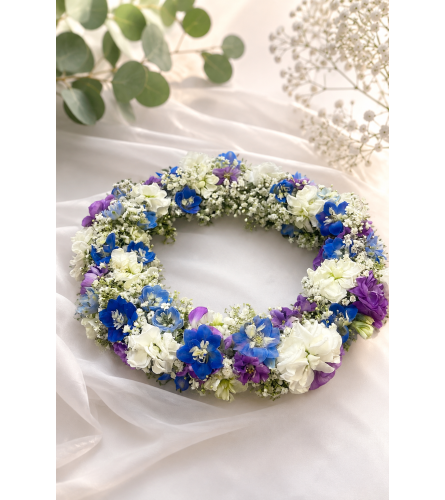 Blue and White floral crown. An arrangement by Floral Lady Design Studio LLC.