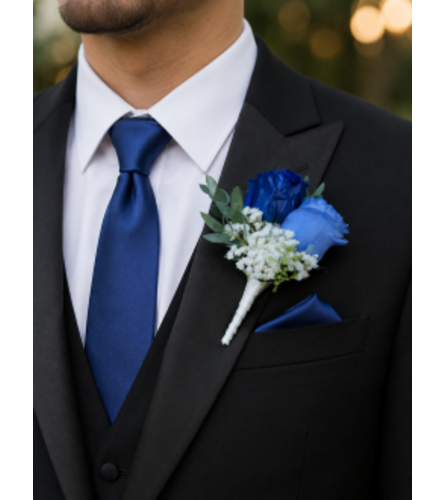 Blue Elegance Boutonniere. An arrangement by Floral Lady Design Studio LLC.