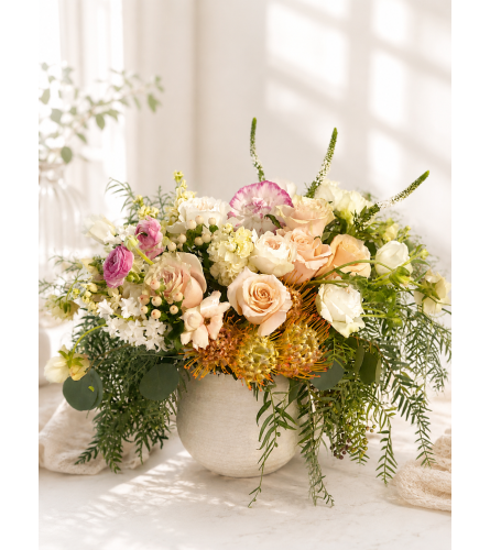 Peach and Petal Embrace. An arrangement by Floral Lady Design Studio LLC.