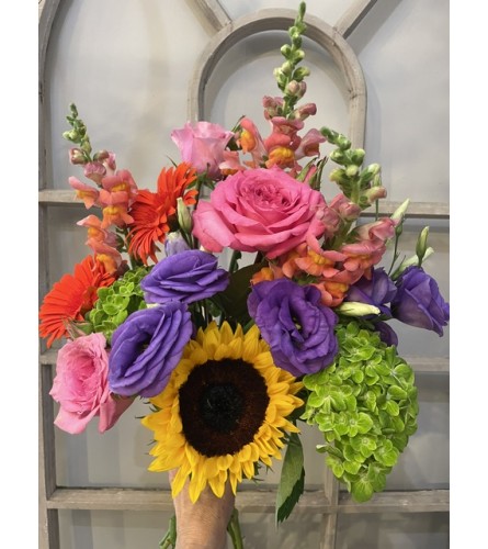 Happy Summer!. An arrangement by Edna Miller Flowers and Gifts Inc..