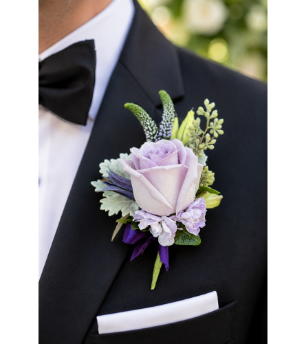 Lavender Whisper Boutonniere. An arrangement by Floral Lady Design Studio LLC.