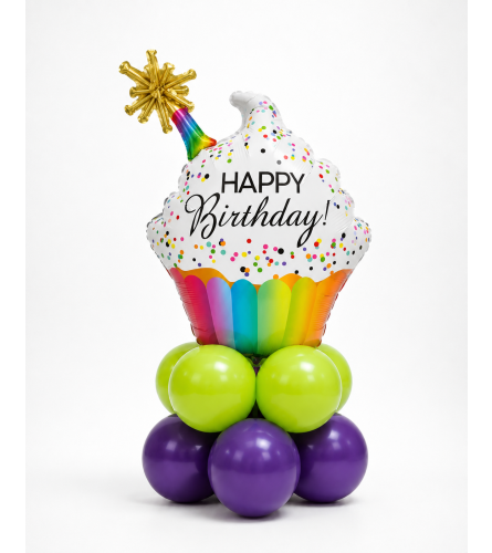 Happy Birthday Rainbow Cupcake Balloon Super Table Topper. An arrangement by Balloon Bouquets Plus.