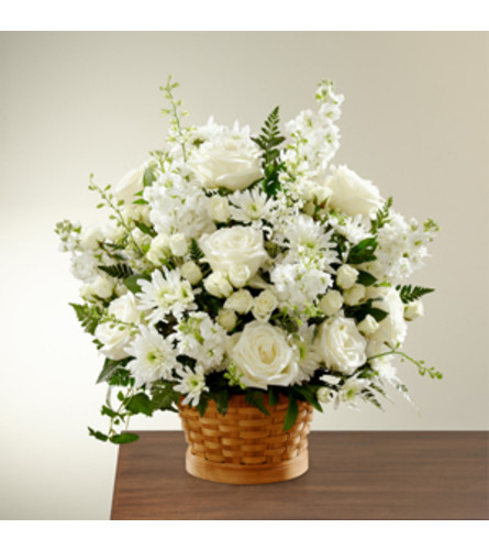 FTD Heartfelt Condolences Arrangement. An arrangement by Fendley Florists.