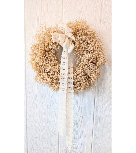 Dried babies breath wreath. An arrangement by Block Farms Flowers.