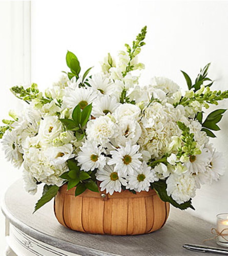 FTD Pure Ivory Basket. An arrangement by Fendley Florists.