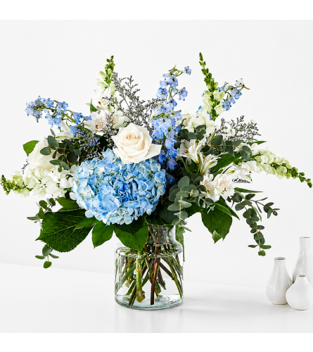 Coastal Bloom - Deluxe. An arrangement by Bill's Flowers Arrangements.