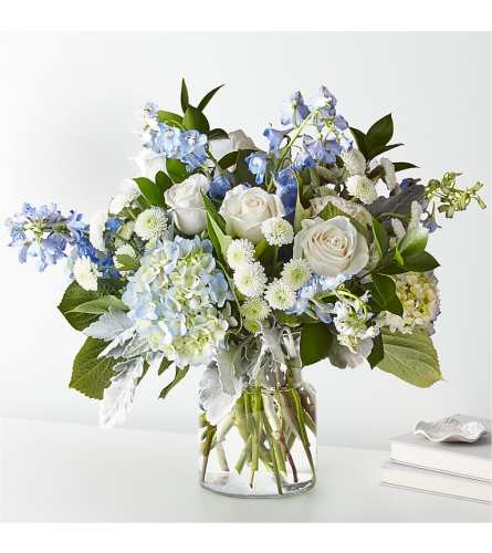 Clear Skies - Deluxe. An arrangement by Bill's Flowers Arrangements.