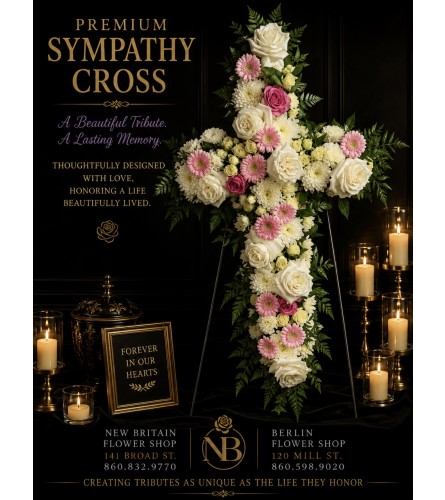 Soft Serenity Cross - Deluxe. An arrangement by Berlin Flower Shop.