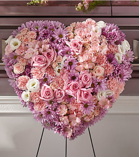 Heaven's light Standing Heart. An arrangement by Fendley Florists.