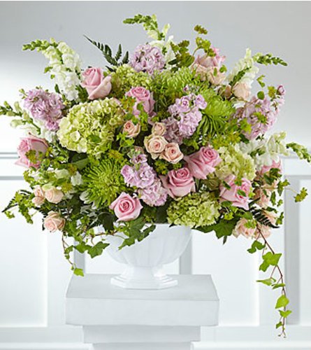 FTD Radiant Embrace Arrangement. An arrangement by Fendley Florists.