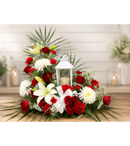 Sympathy Lantern. An arrangement by Fink Flowers Gifts and Flower Delivery.