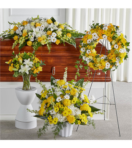Warm Remembrance Casket Spray Bundle. An arrangement by J.D. Ballantine's Flowers and Gifts.