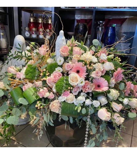 Tender Grace Casket Spray - Deluxe. An arrangement by New Britain Flower Shop.