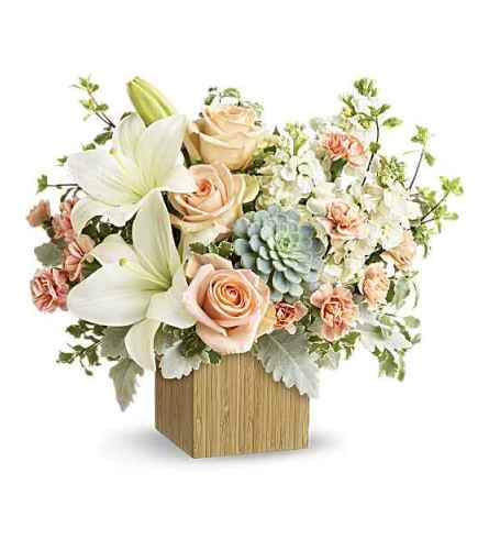 Teleflora's Desert Sunrise - Deluxe. An arrangement by Marivel's Florist and Gifts.