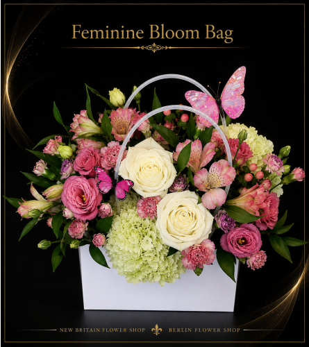 Feminine Bloom Bag - Deluxe. An arrangement by New Britain Flower Shop.