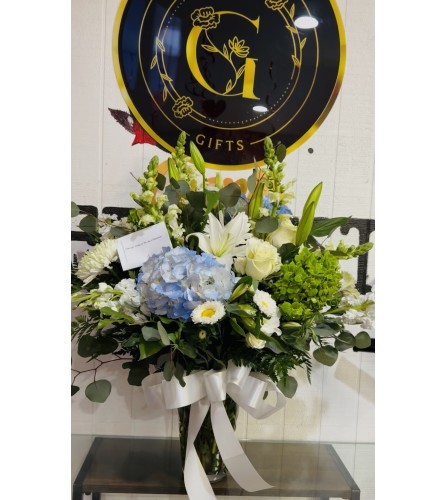 Tranquil Garden Embrace - Deluxe. An arrangement by Geni's Florist and Gifts.