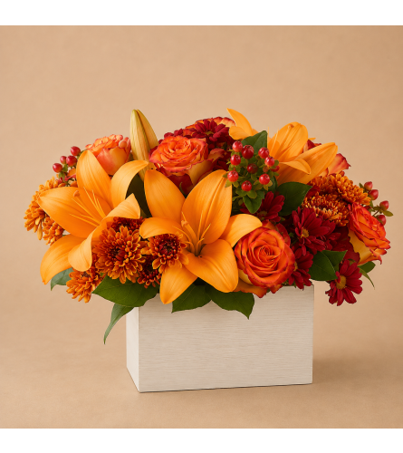 Radiant Ember Blossoms - Deluxe. An arrangement by Bill's Flowers Arrangements.