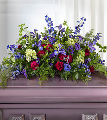 FTD Always Treasured Casket Spray. An arrangement by Fendley Florists.