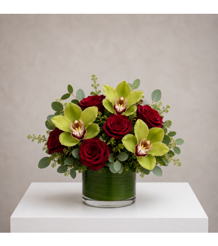 Enchanted Rose and Orchid. An arrangement by Bill's Flowers Arrangements.