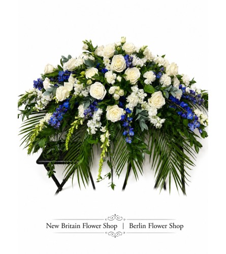 Tranquil Blooms Symphony Casket Spray - Deluxe. An arrangement by Berlin Flower Shop.