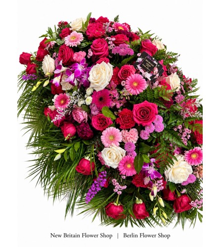 Bloom Elegance Casket Spray - Deluxe. An arrangement by New Britain Flower Shop.