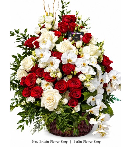 Timeless Elegance Basket - Deluxe. An arrangement by Berlin Flower Shop.