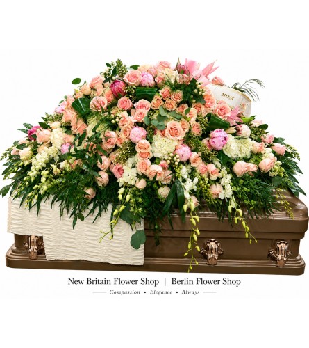 Peach Blossom Casket Spray - Deluxe. An arrangement by Berlin Flower Shop.