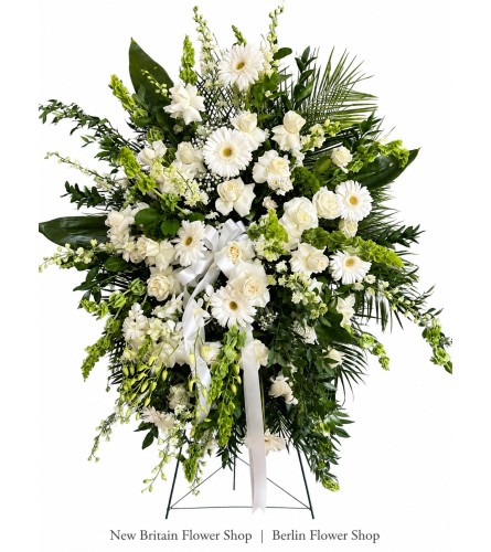 White Harmony Spray - Deluxe. An arrangement by Berlin Flower Shop.