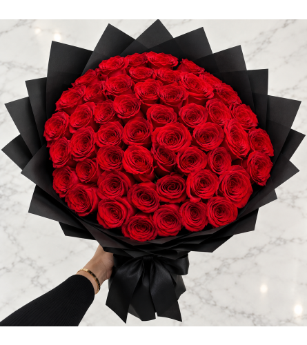 Super Deal Passionate Bouquet. An arrangement by Brickell Ave Florist.