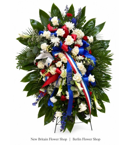 Patriotic Tribute Funeral Spray - Deluxe. An arrangement by New Britain Flower Shop.