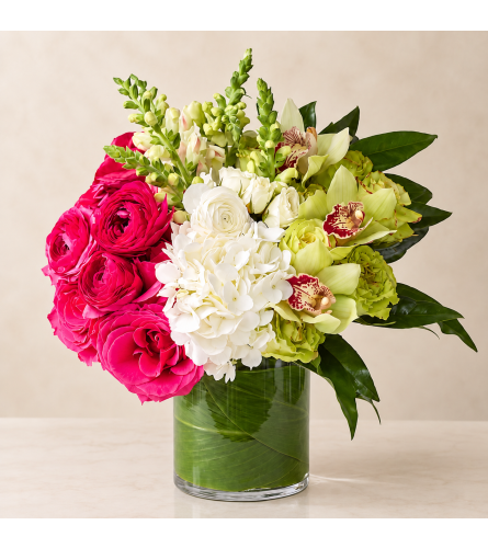 The Oasis. An arrangement by Bill's Flowers Arrangements.