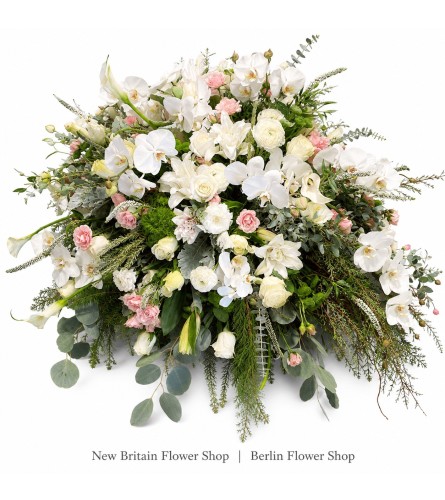 Angelic Elegance Casket Spray - Deluxe. An arrangement by New Britain Flower Shop.