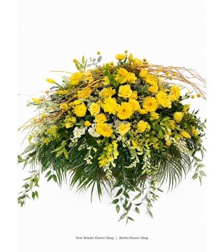 Golden Memories Casket Spray - Deluxe. An arrangement by New Britain Flower Shop.