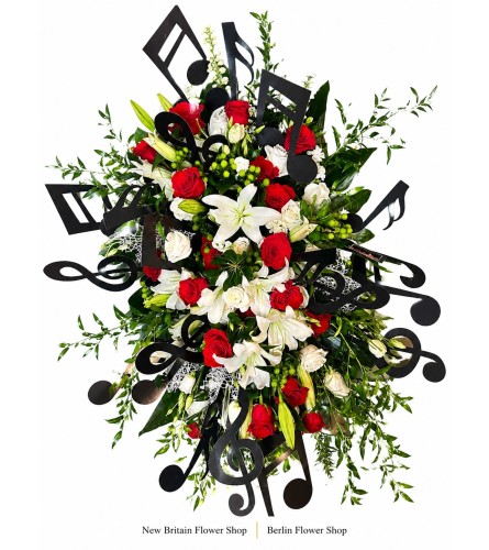 Melody of Memories Standing Spray - Deluxe. An arrangement by New Britain Flower Shop.