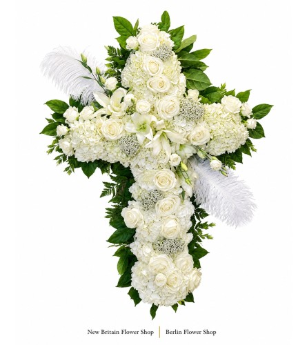 Angel’s Embrace Floral Cross - Deluxe. An arrangement by New Britain Flower Shop.